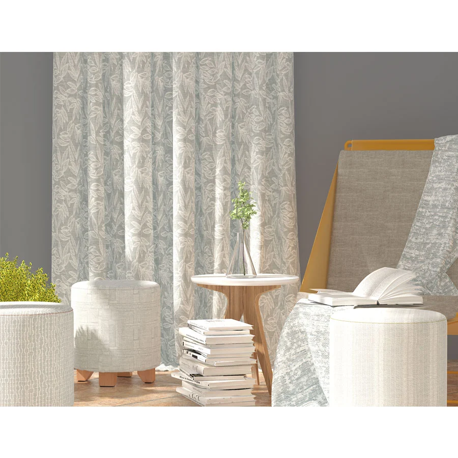 Sunny Drape Cotton World botanical curtain fabric styled with a chair and side table